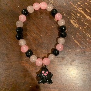 NEW HANDMADE GLASS BEAD BRACELET WITH BLACK GHOST CHARM